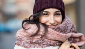 Woman wearing scarf and hat
