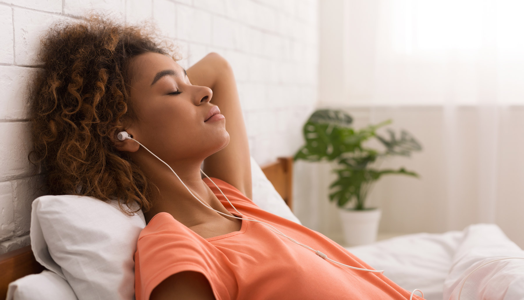 Woman listening to music and resting