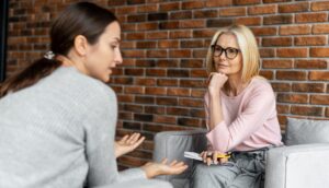 Woman talks to therapist